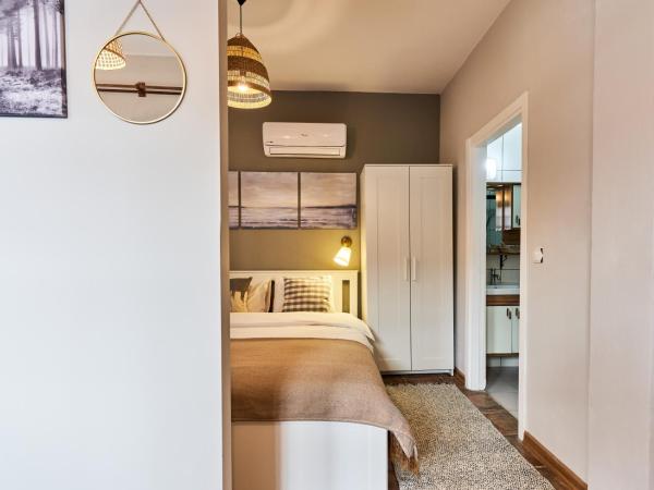 Cicerone Apart : photo 5 de la chambre appartement - vue sur jardin