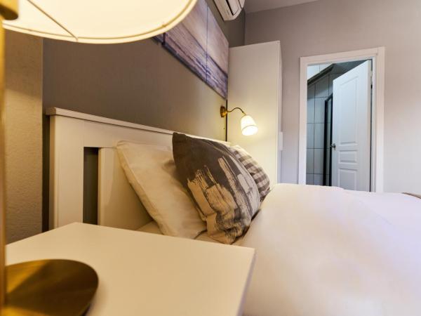 Cicerone Apart : photo 6 de la chambre appartement - vue sur jardin