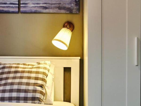 Cicerone Apart : photo 8 de la chambre appartement - vue sur jardin