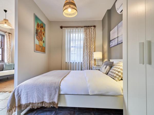 Cicerone Apart : photo 4 de la chambre appartement - vue sur jardin