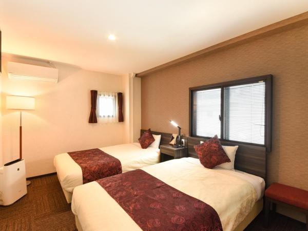 Arima Onsen Koki : photo 1 de la chambre petite chambre lits jumeaux