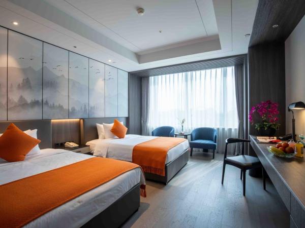 Shanghai Tiancheng Hotel : photo 1 de la chambre chambre lits jumeaux deluxe