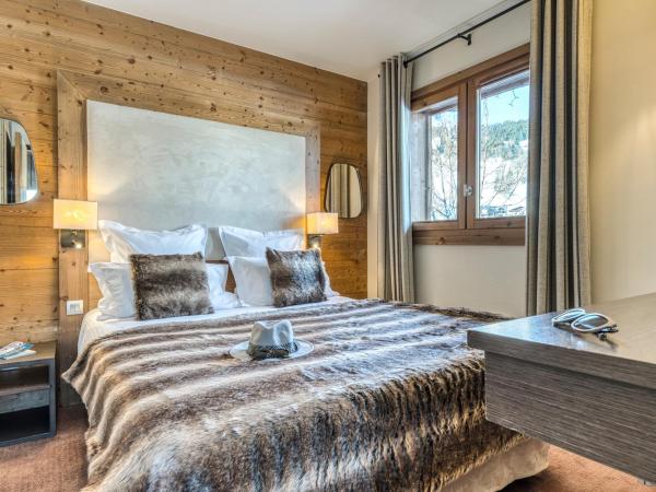 Les Loges Blanches : photo 7 de la chambre suite familiale