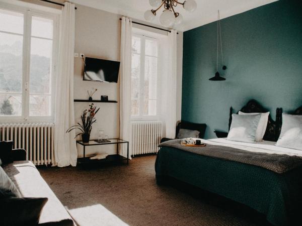 Hotel Spa Azteca Barcelonnette : photo 1 de la chambre grande chambre triple