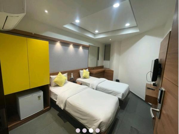 Hotel Avaante Ahmedabad Formerly known as The Orchid Hotel : photo 2 de la chambre chambre lits jumeaux deluxe