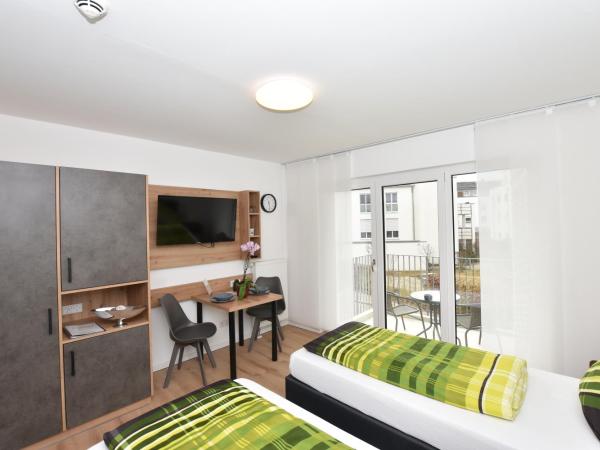 Boardinghouse Henschelstraße : photo 5 de la chambre chambre double ou lits jumeaux avec balcon