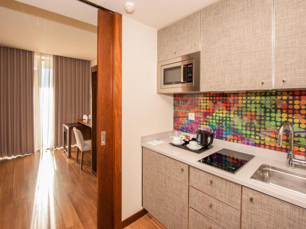 Eurostars Oporto : photo 6 de la chambre chambre lits jumeaux avec lit d’appoint - 301