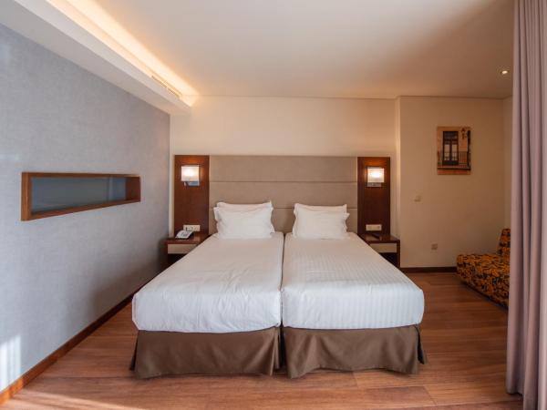 Eurostars Oporto : photo 4 de la chambre chambre lits jumeaux avec lit d’appoint - 301