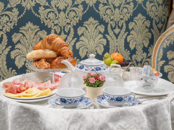 Residenza La Loggia : photo 6 de la chambre chambre triple