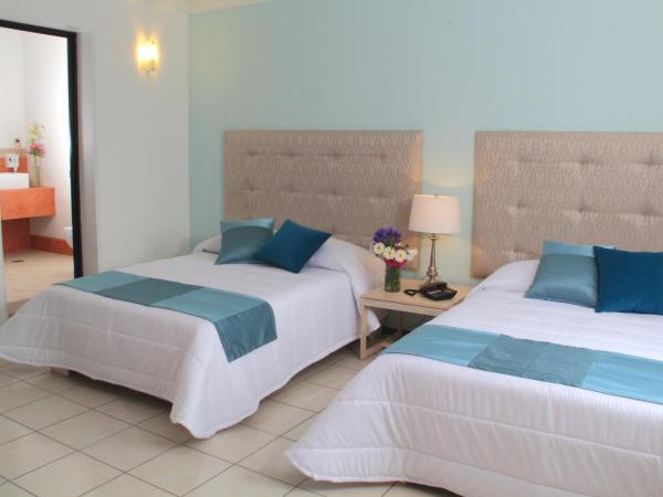 Hotel La Casa de María : photo 7 de la chambre chambre double avec 2 lits doubles