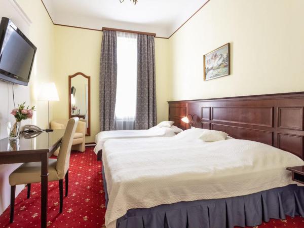 Hotel Viktoria Schönbrunn : photo 1 de la chambre chambre triple