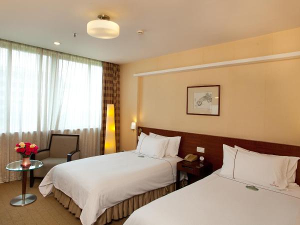 Liuhua Hotel : photo 5 de la chambre chambre lits jumeaux standard