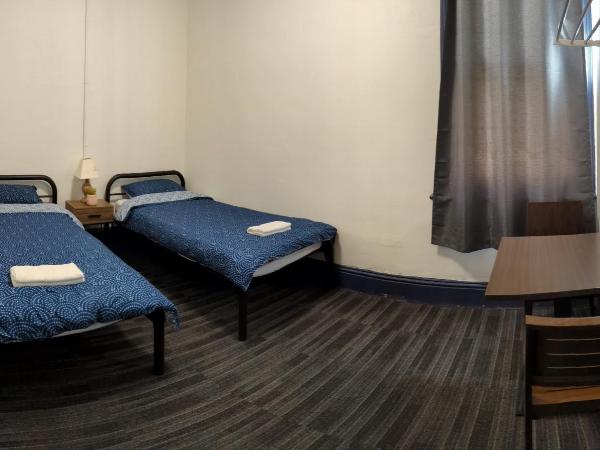 Queen Victoria Hostel : photo 6 de la chambre chambre lits jumeaux standard