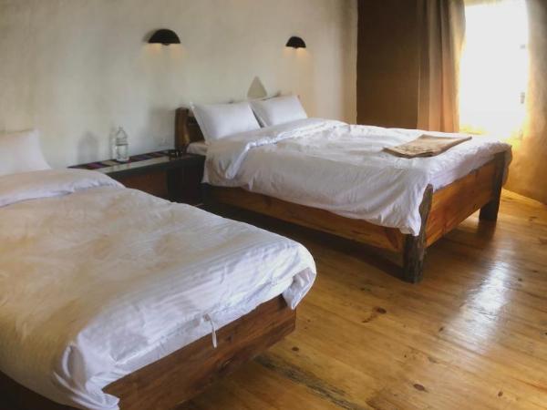 Bhanjyang Village Lodge : photo 4 de la chambre chambre double ou lits jumeaux