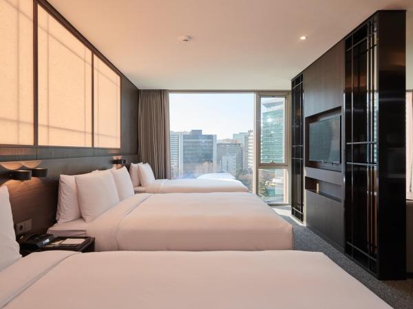 Nine Tree Premier Hotel Insadong Myeongdong : photo 4 de la chambre suite à 4 lits