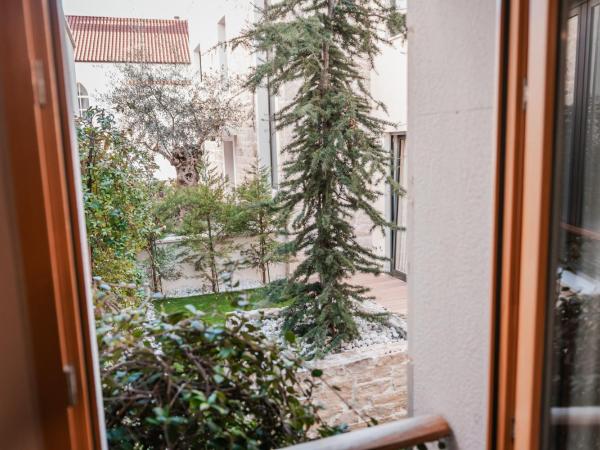 Armerun Heritage Hotel & Residences : photo 3 de la chambre chambre double ou lits jumeaux standard - vue sur jardin