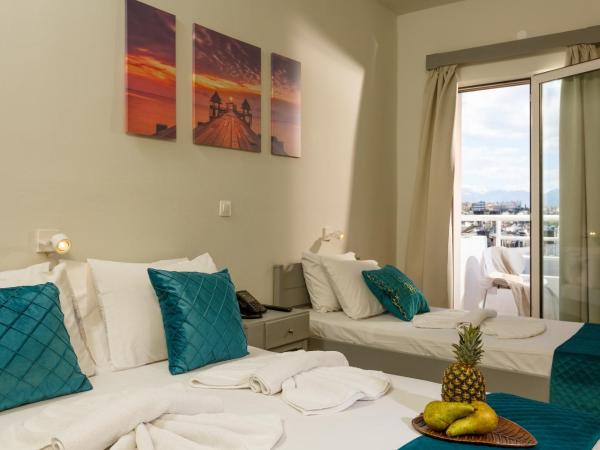 Asterion Hotel : photo 1 de la chambre chambre triple