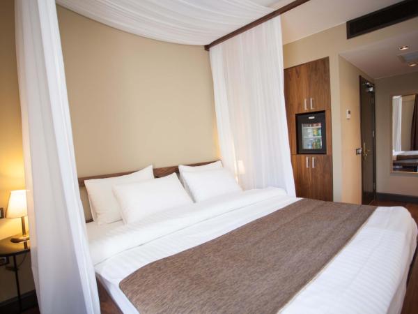 Juliet Rooms & Kitchen : photo 4 de la chambre chambre double deluxe avec baignoire