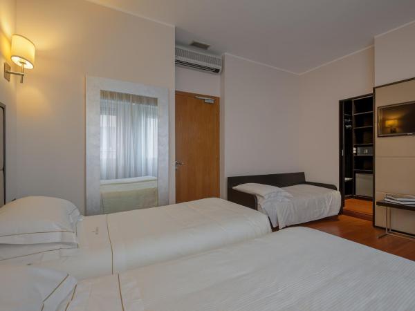 Hotel Ariston : photo 3 de la chambre chambre triple