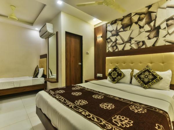 Hotel Guestinn Residency : photo 2 de la chambre chambre triple deluxe