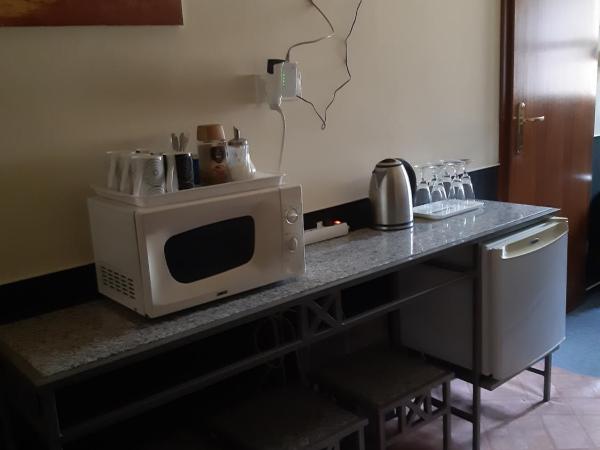 Berg Toboz Panzió : photo 2 de la chambre chambre lits jumeaux - vue sur jardin