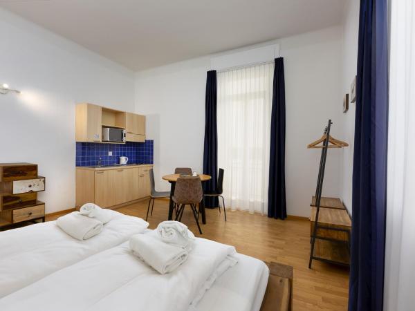 GuestHouse Lugano Center by LR : photo 3 de la chambre chambre familiale confort