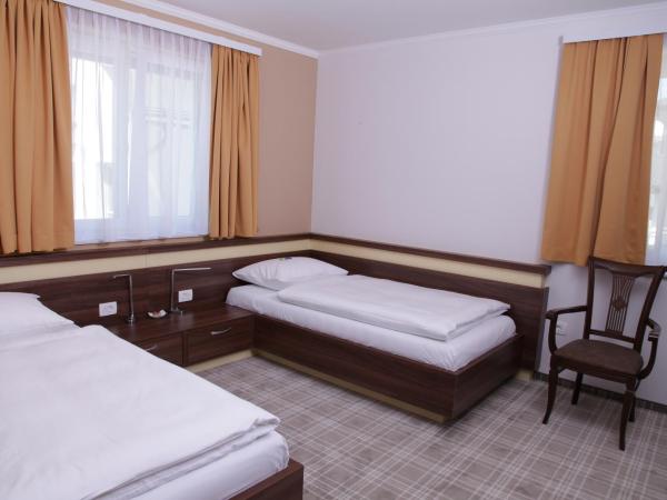 Primus Hotel & Apartments : photo 1 de la chambre chambre lits jumeaux