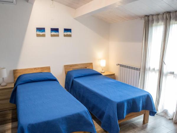 Alghero in bicicletta : photo 9 de la chambre chambre lits jumeaux avec salle de bains privative