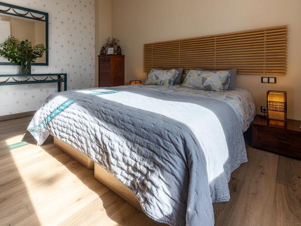 Finca Almenara de Copau : photo 1 de la chambre chambre double ou lits jumeaux - vue sur jardin