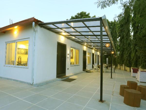 Family Vacay In Green Settings : photo 2 de la chambre appartement - vue sur jardin