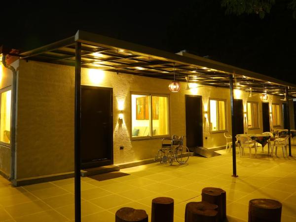 Family Vacay In Green Settings : photo 5 de la chambre appartement - vue sur jardin