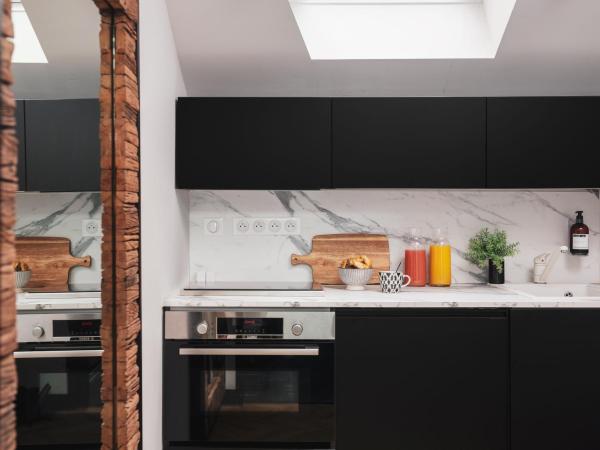 Maisons du Monde Hotel & Suites - Nantes : photo 4 de la chambre appartement mansardé 1 chambre proche de place royale - 35 m² - carthagène