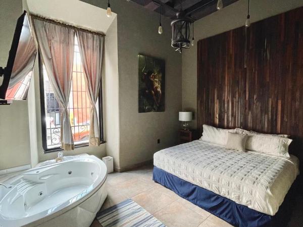 Independencia Dos 7 Hotel Boutique : photo 2 de la chambre suite lit king-size