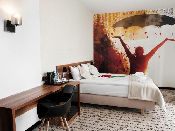 Hotel Piano : photo 5 de la chambre chambre lit king-size