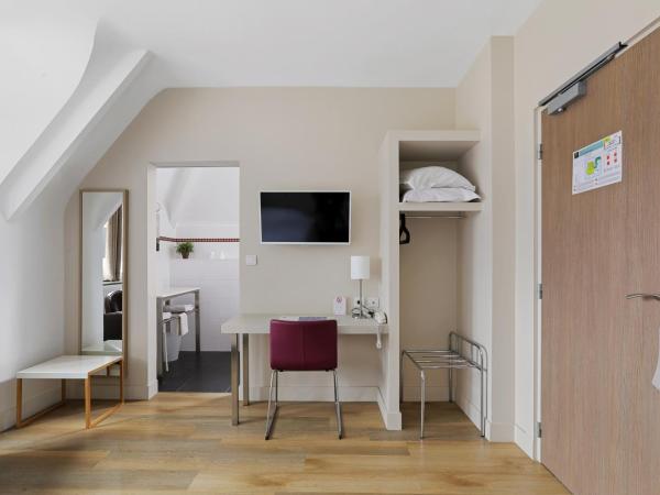 Hôtel Cardinal : photo 2 de la chambre chambre triple