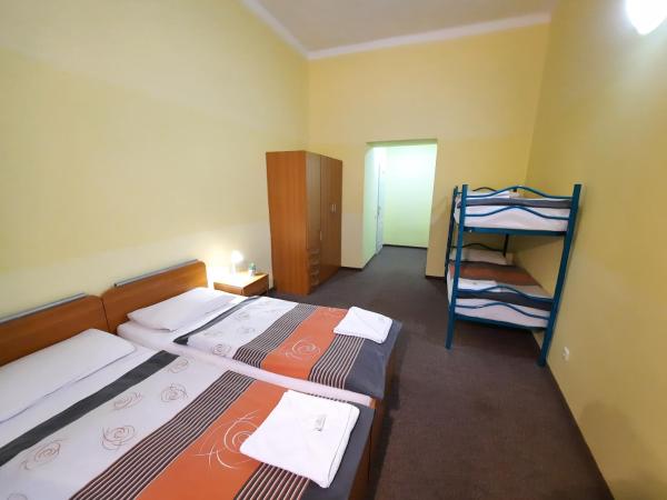 Pension City Center : photo 5 de la chambre chambre quadruple