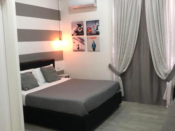 Napoli DownTown : photo 7 de la chambre grande chambre double 