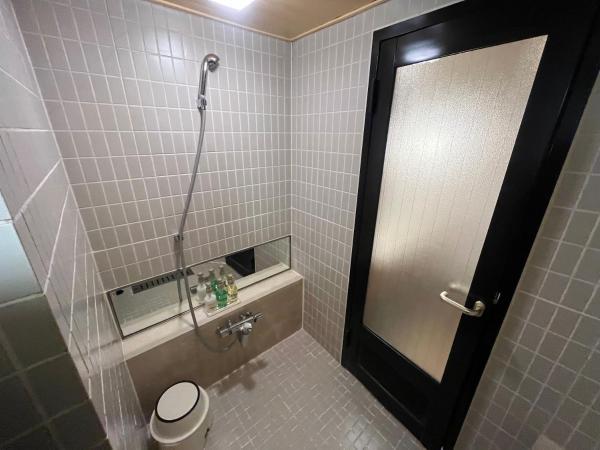 Jasmac Plaza Hotel : photo 2 de la chambre chambre lits jumeaux de style japonais - fumeurs