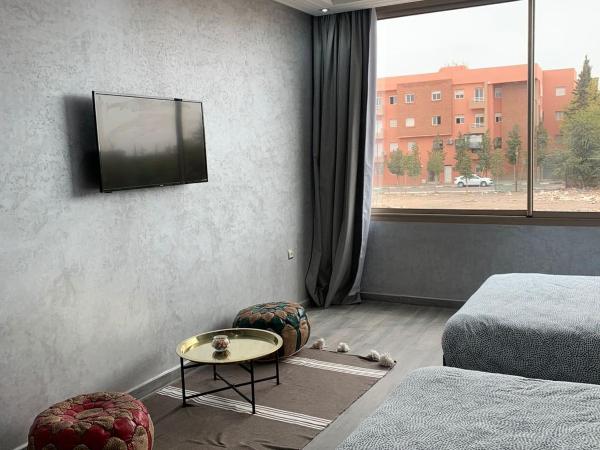 Riad L'Aéroport : photo 3 de la chambre chambre deluxe avec 2 lits queen-size