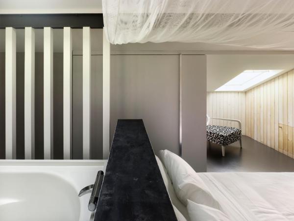 Moure Hotel : photo 3 de la chambre chambre double deluxe avec baignoire