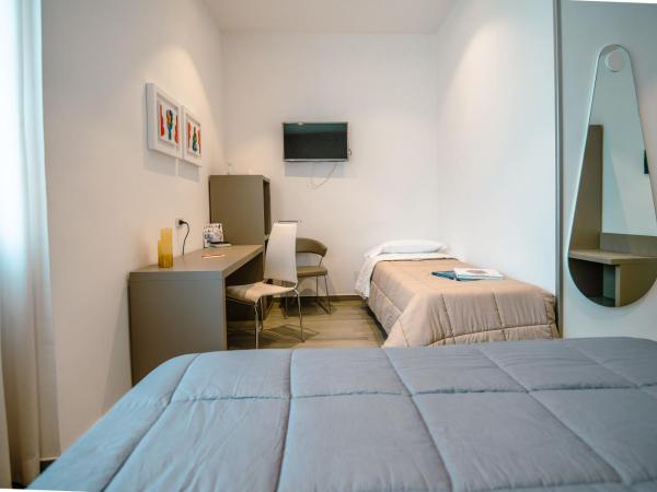 Hotel Bruman Salerno : photo 4 de la chambre chambre triple