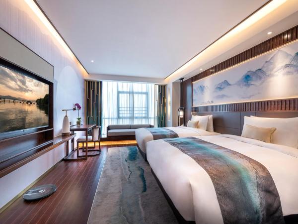 New Century Hotel Qianchao Hangzhou : photo 1 de la chambre chambre lits jumeaux deluxe