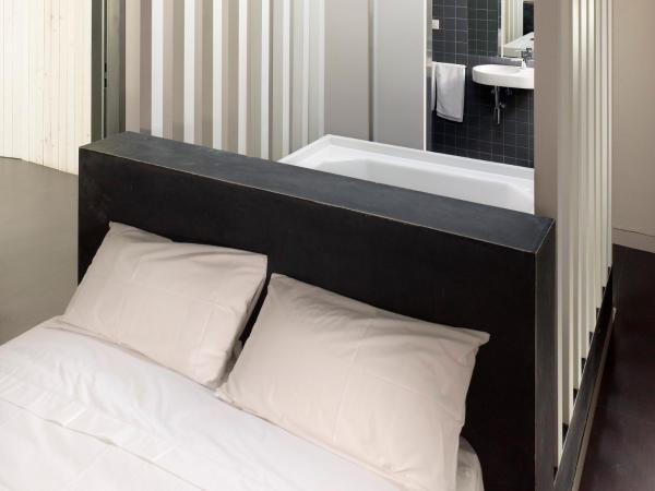 Moure Hotel : photo 1 de la chambre chambre double deluxe avec baignoire