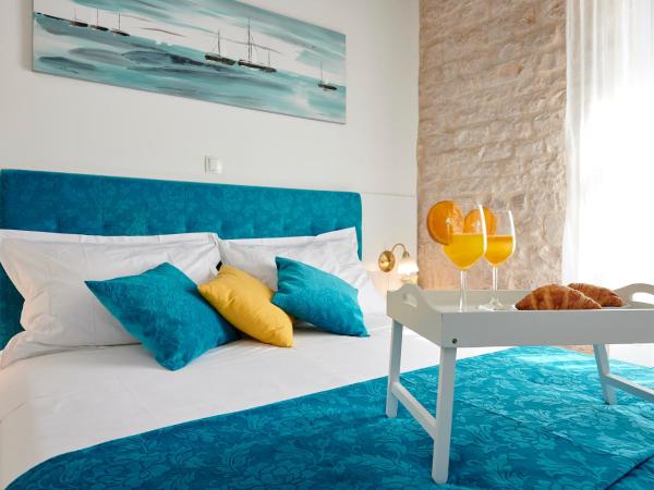 Palace Central Square : photo 2 de la chambre chambre lit king-size