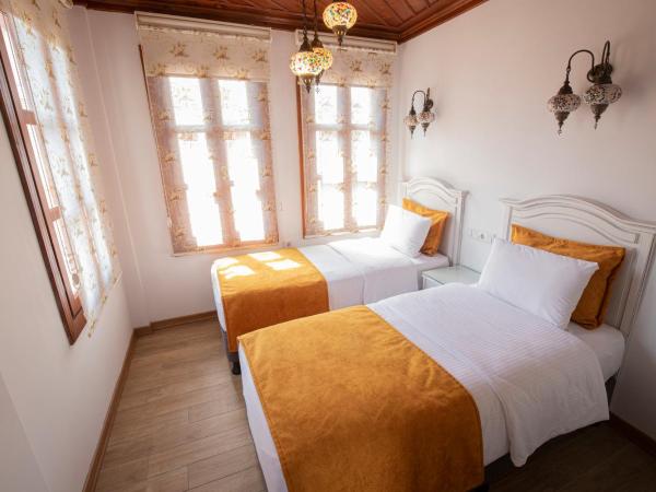 White Garden Hotel-Adult Only : photo 2 de la chambre chambre lits jumeaux