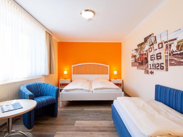 Hotel Heldt Dependance : photo 7 de la chambre chambre quadruple