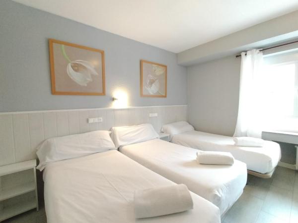 Hostal Albero by gaiarooms : photo 2 de la chambre chambre quadruple