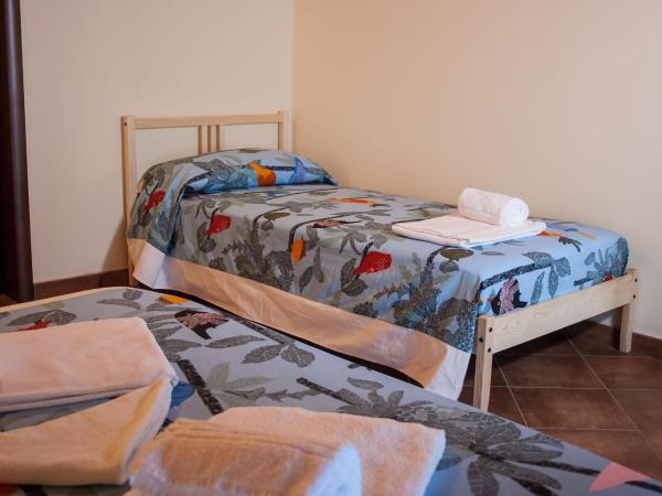 Le Coccole : photo 6 de la chambre chambre triple classique