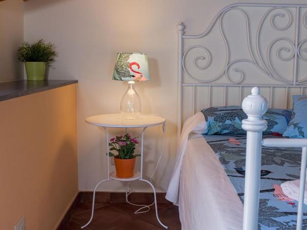 Le Coccole : photo 3 de la chambre chambre triple classique