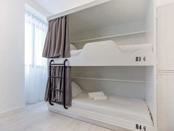 Musical Hostel : photo 1 de la chambre lit dans dortoir mixte de 4 lits